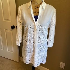 Chico’s white blouse/tunic with cutouts.